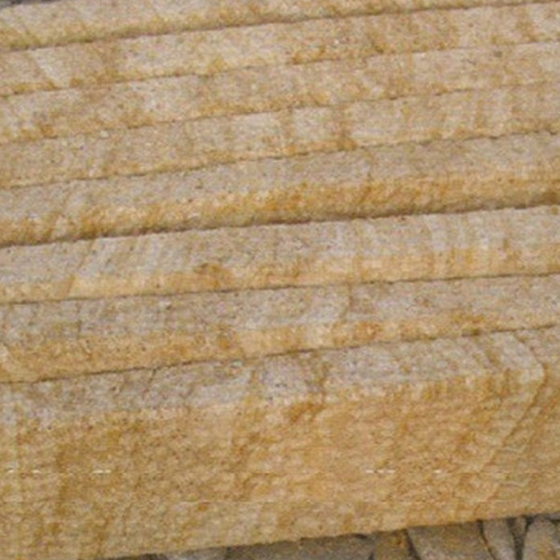 Holzmaserung aus gelbem Sandstein